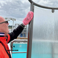 Ship Cleaning Operative cleans the dirt, grease and limescale from the steel fixtures of a pool-side shower