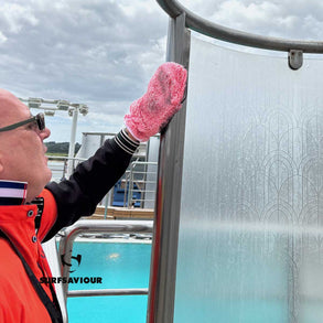 Ship Cleaning Operative cleans the dirt, grease and limescale from the steel fixtures of a pool-side shower