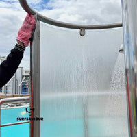 Ship Cleaning Operative cleans the dirt, grease and limescale from the steel fixtures of a pool-side shower