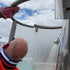 Ship Cleaning Operative cleans the dirt, grease and limescale from the steel fixtures of a pool-side shower